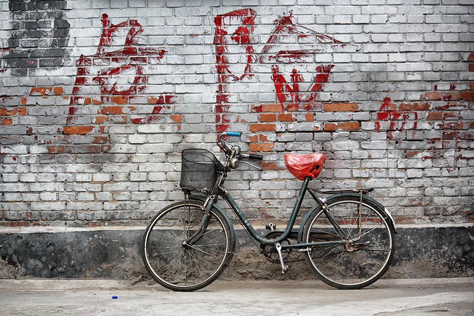 bicycle next to wall